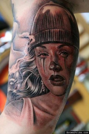 Chicano style tattoo designs often represent the loyalty 